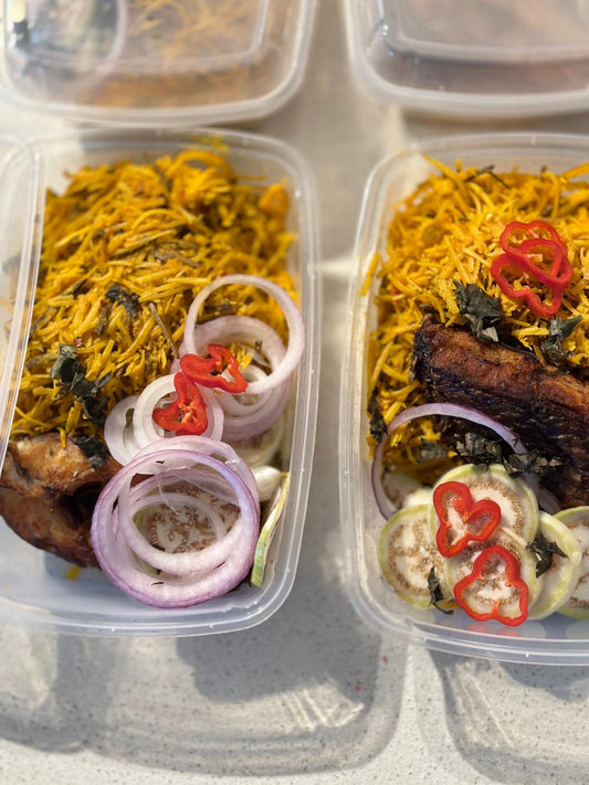 Plate of delicious Abacha (Tapioca meal) with fried or grilled fish